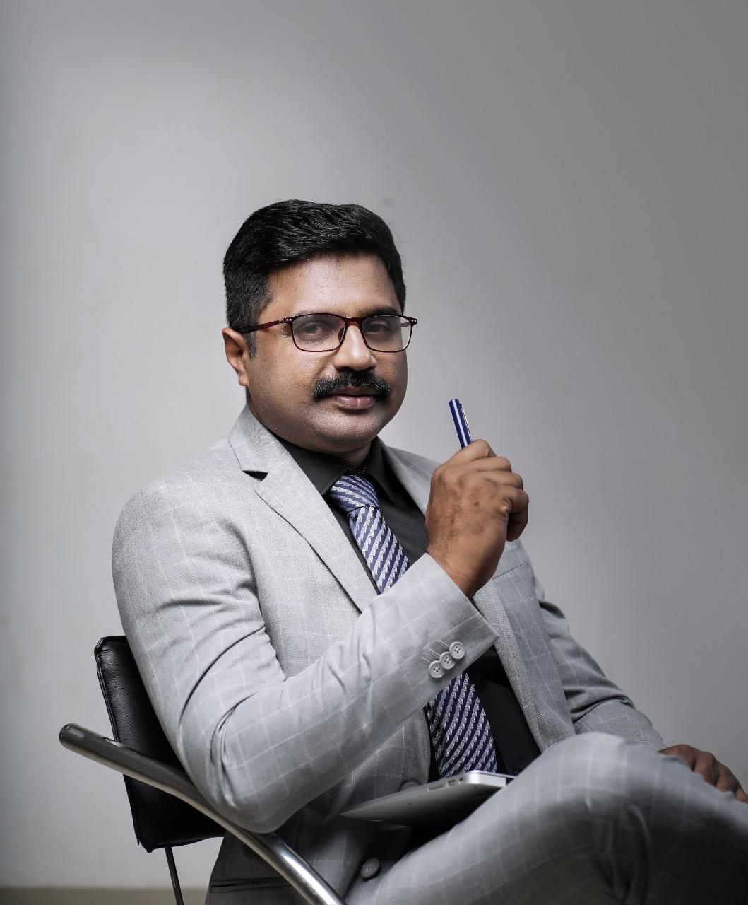 Dr. Praveen Jacob professional portrait